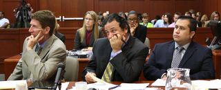 George Zimmerman, right, and his legal team listen to potential jurors. (Getty Images)